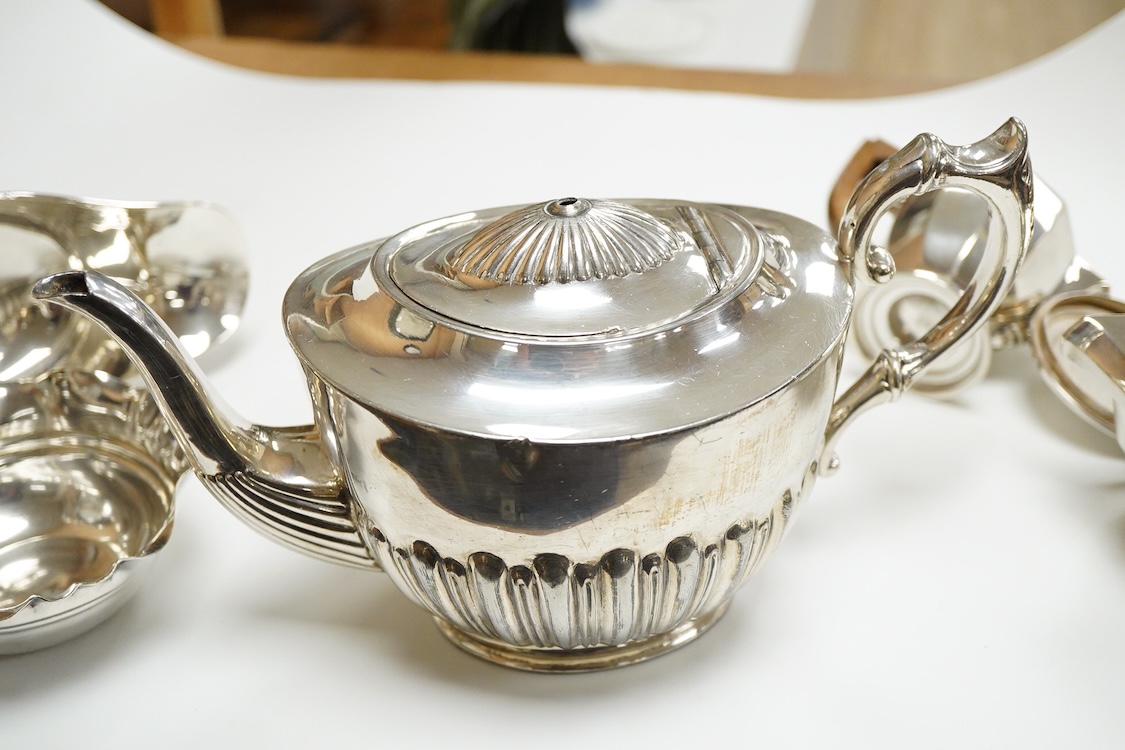 A 20th century continental 800 standard white metal hot water pot and cream jug (lacking cover and knop), gross weight 11.2oz, together with a plated teapot, sauceboat and bowl.